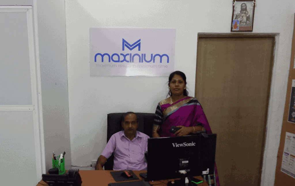 Anthony Brother's parents sitting on Maxinium office.